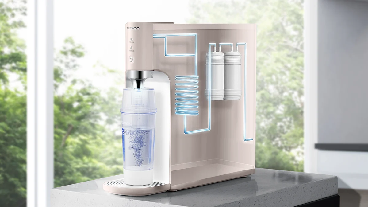 CUCKOO Pink water purifier, with a cutaway view revealing its internal filters and spiral water path with glowing lines. (cp-tn102)