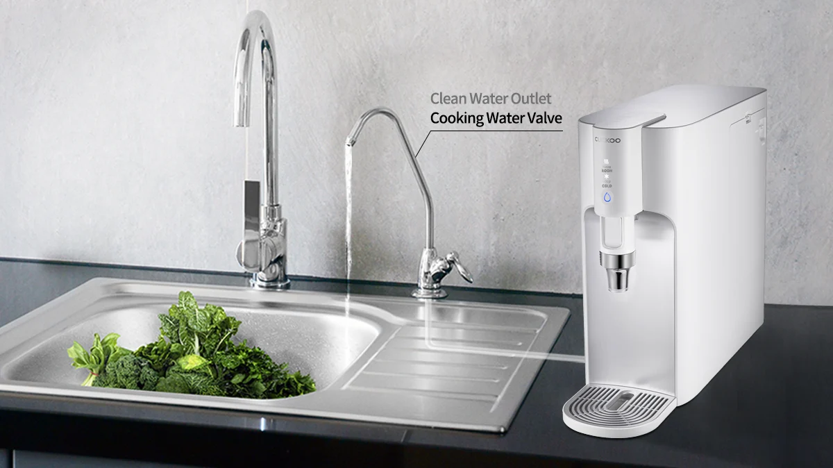 CUCKOO water purifier connected to a kitchen sink faucet, illustrating clean water outlet and cooking water valve features. (cp-tn102)